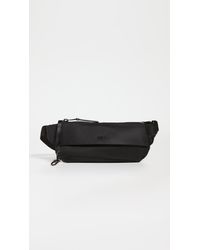 tumi voyageur madison hip bolsa