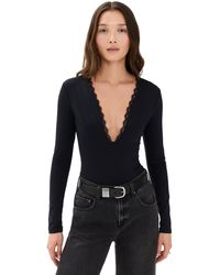Fleur du Mal - Margo Lace Long Sleeve Thong Bodysuit - Lyst