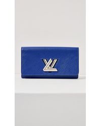 What Goes Around Comes Around Louis Vuitton White Multi Pochette Coin Purse  - ShopStyle Wallets & Card Holders