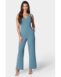 Bebe - Scuba Crepe V-Neck Jumpsuit - Lyst