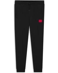 HUGO - Pants - Lyst