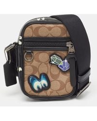 COACH - X Disney Signature Coated Canvas And Leather Crossbody Bag - Lyst