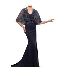 Montage by Mon Cheri - Sleeveless Crepe Fit And Flare Gown With Cape - Lyst