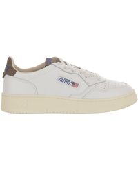 Autry - Low-Top Leather Sneakers With Suede Heel Tab And Logo Details - Lyst