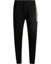 BOSS - Cotton-Terry Tracksuit Bottoms With Stripe Print - Lyst