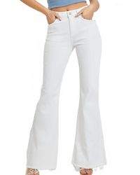 Risen - Mid Rise Tummy Control Flare Jeans - Lyst