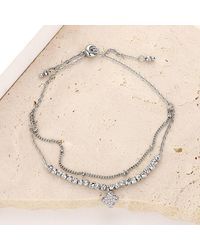 Fashnzfab - Cz Stone Paved Quatrefoil Charm Pointed Brass Metal Adjustable Pull Tie Bracelet Clear, Rhodium - Lyst