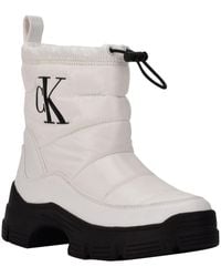 Calvin Klein - Delicia Quilted Ankle Winter & Snow Boots - Lyst