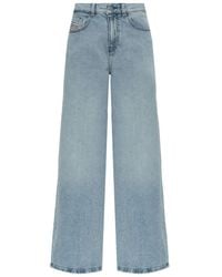 DIESEL - Wide-Leg Denim Jeans With Logo Patch - Lyst