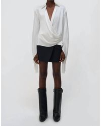 Jonathan Simkhai - Paradisa Cascade Sleeve Wrap Top - Lyst