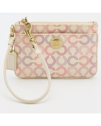 COACH - Color Coated Canvas Clutch Bag - Lyst