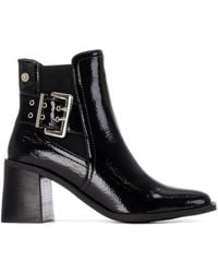 Xti - Heeled Patent Leather Chelsea Booties By - Lyst