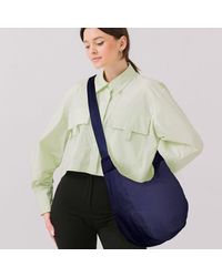 Fashnzfab - Solid Nylon Sling Bag Crossbody Bag - Lyst