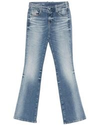 DIESEL - Faded Denim Jeans With Flared Silhouette - Lyst