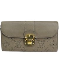 Louis Vuitton - Portefeuille Iris Leather Wallet (pre-owned) - Lyst