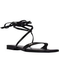 Calvin Klein - Minola Faux Leather Ankle Tie Thong Sandals - Lyst