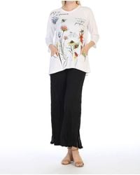 Jess & Jane - Garden Song Patch Pocket High Low Top - Lyst