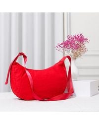 Fashnzfab - Solid Nylon Sling Bag Crossbody Bag - Lyst