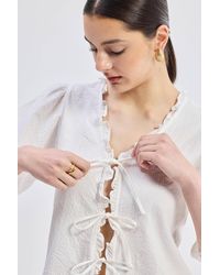 REISTOR - Relaxed Fit Top With Ruffles And Front-Ties - Lyst