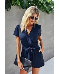 TRUEDAMES - Stretch Belted Plunge Neck Wrap Knot Side Romper - Lyst