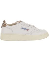 Autry - Low-Top Leather Sneakers With Suede Heel Tab And Logo Accents - Lyst