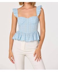 Astr - Baylin Eyelet Corset Peplum Top - Lyst