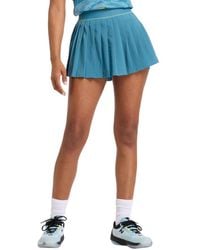New Balance - Pleated Tournament Skort - Lyst