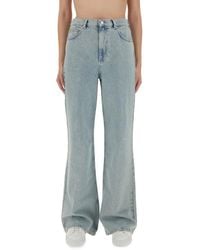 Moschino - Wide-Leg Light Denim Jeans - Lyst