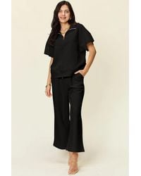 TRUEDAMES - Full Size Texture Half Zip Short Sleeve Top And Pants Set - Lyst