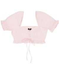 CALLIPYGIAN - Lace Up Ruffle Crop Top - Lyst