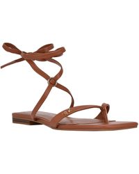 Calvin Klein - Minola Faux Leather Ankle Tie Thong Sandals - Lyst