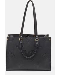Louis Vuitton - Monogram Giant Empreinte Leather Onthego Mm Bag - Lyst