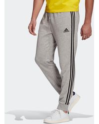 essentials french terry tapered cuff 3 stripes joggers