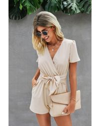 TRUEDAMES - Stretch Belted Plunge Neck Wrap Knot Side Romper - Lyst