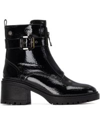 Xti - Patent Leather Heeled Ankle Booties By - Lyst