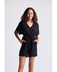 REISTOR - V Neck Drawstring Romper - Lyst