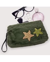 Fashnzfab - Star Patches Fuzzy Faux Fur Wristlet Clutch Bag - Lyst