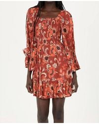 Angie - Fall Printed Bell Sleeve Smocked Bodice Mini Dress - Lyst