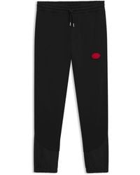 HUGO - Cotton-Blend Tracksuit Bottoms With Waxed-Stamp Logo - Lyst