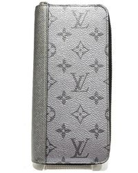 Louis Vuitton - Zippy Wallet Vertical Canvas Wallet (pre-owned) - Lyst