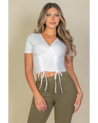 TRUEDAMES - Ribbed Ruched Drawstring Surplice Top - Lyst