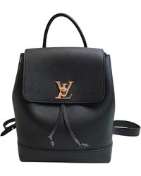 Louis Vuitton - Lockme Leather Backpack Bag (pre-owned) - Lyst