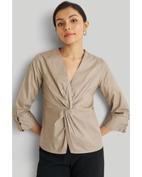 REISTOR - Front Twist Top - Lyst