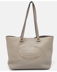 Prada - Vitello Daino Leather Logo Embossed Tote - Lyst