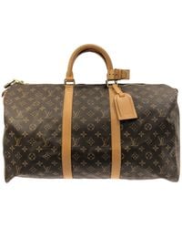 Speedy cloth handbag Louis Vuitton Brown in Cloth - 36264791