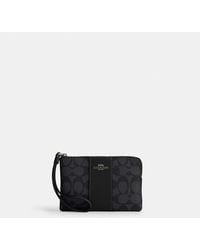 COACH - Signature Canvas Wristlet Clutch - Lyst