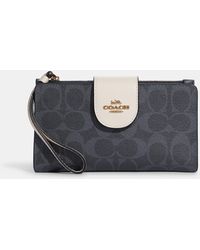 coach tech phone wallet in colorblock signature canvas