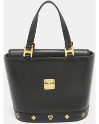 MCM - Leather Flap Studded Bucket Tote - Lyst