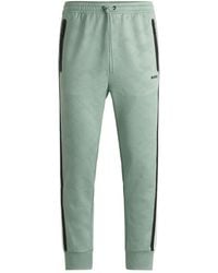 BOSS - Relaxed-Fit Tracksuit Bottoms With Jacquard-Woven Circles - Lyst