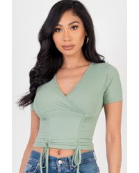 TRUEDAMES - Fashnzfab Ribbed Ruched Drawstring Surplice Top - Lyst